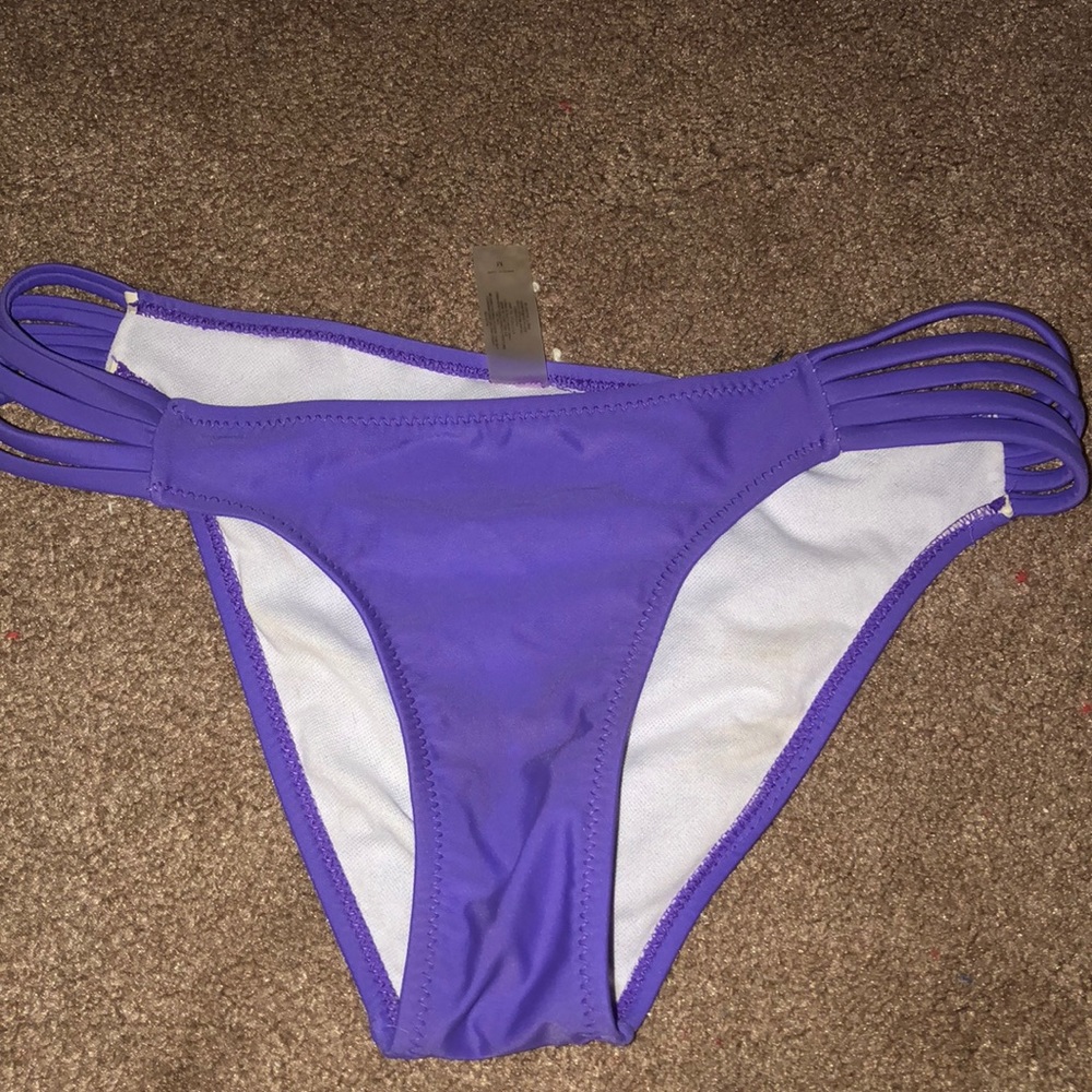 Purple Victoria secret swim suit bottoms